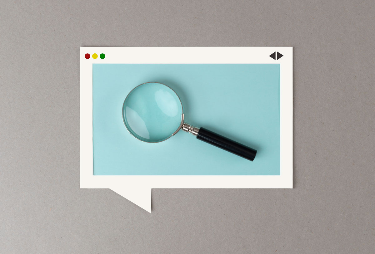 white box containing a magnifying glass to illustrate why your small business needs seo