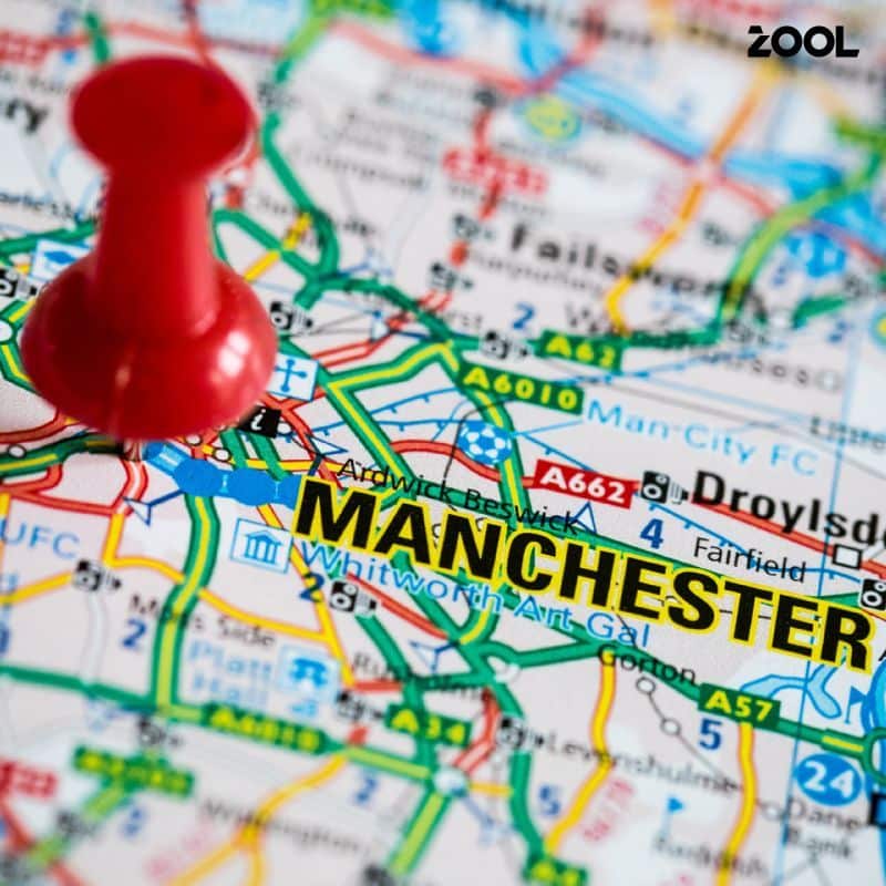 Red map pin marking Manchester on a road map, representing North West innovation visibility.